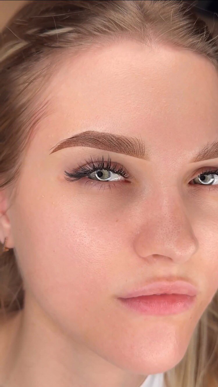 a close up of a woman's face