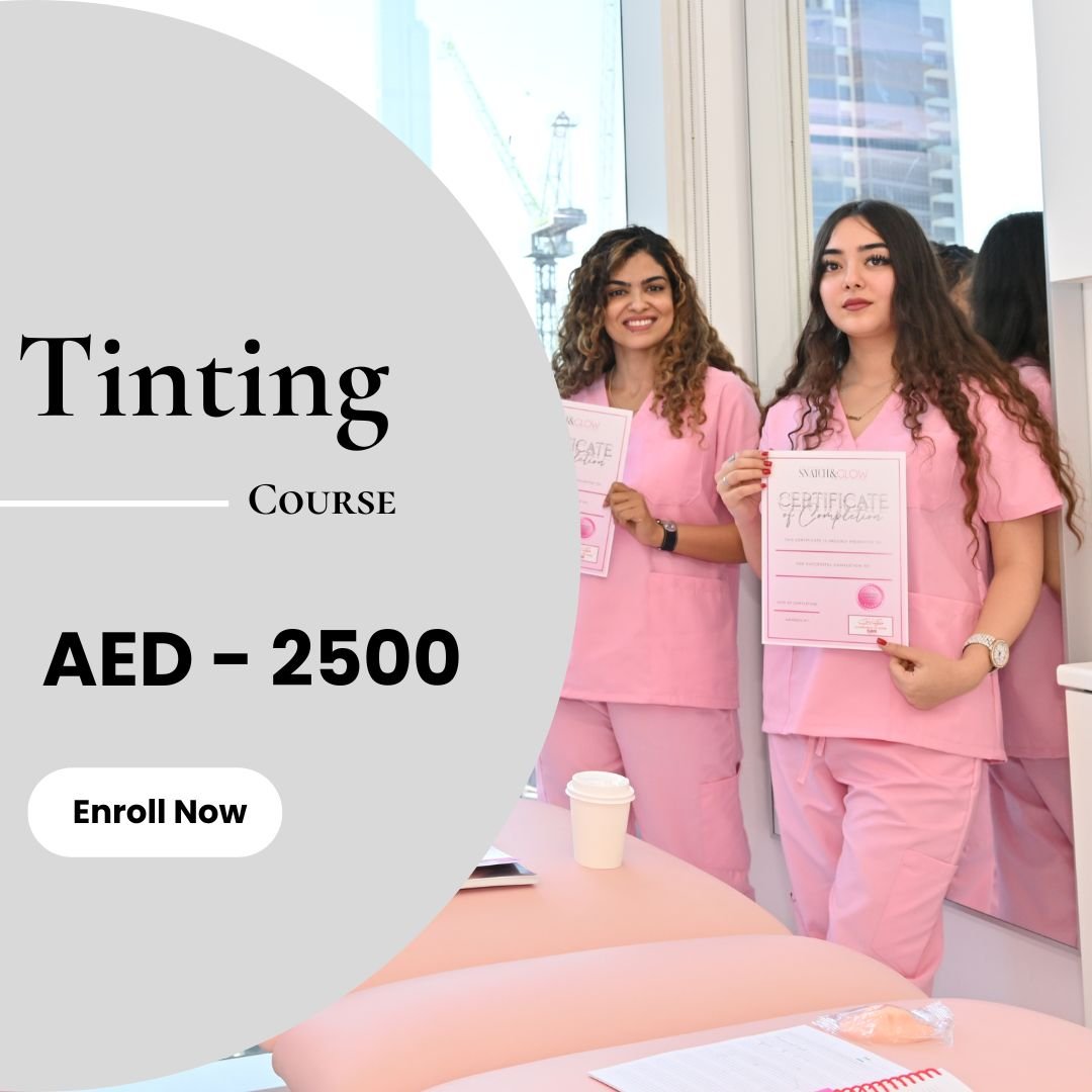 a group of women in pink scrubs